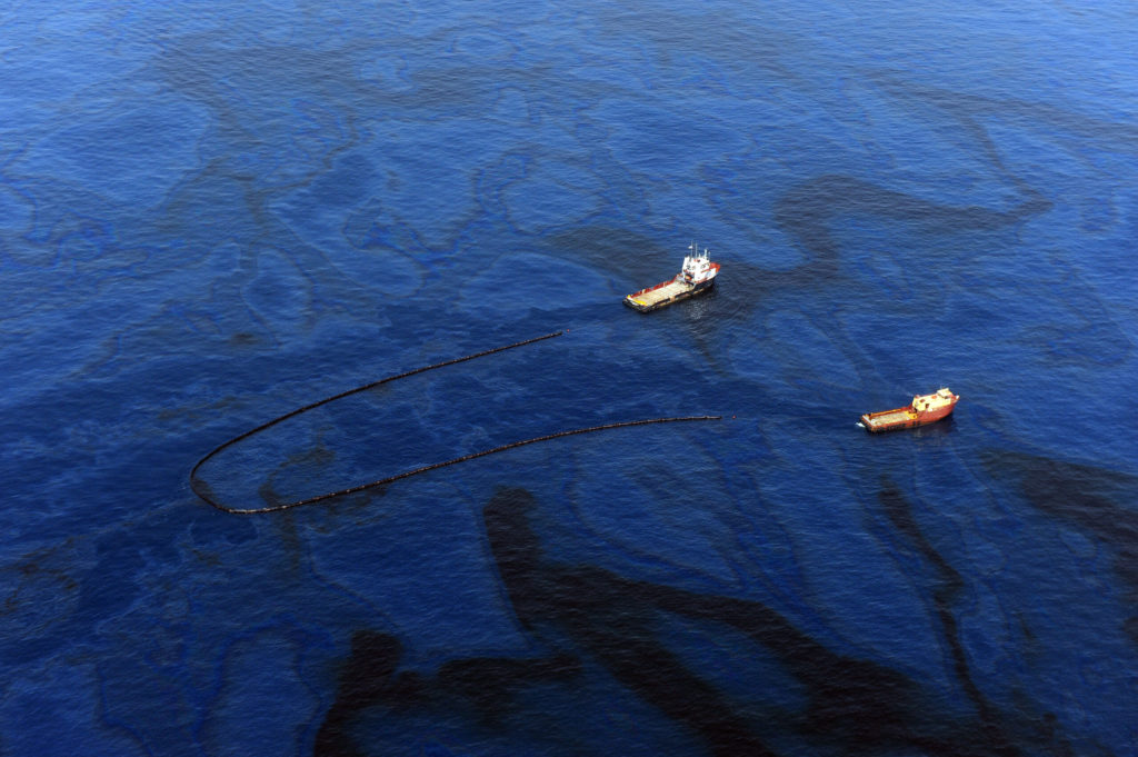 Two boats in the oil-ridden Gulf of Mexico after the BP Deepwater Horizon disaster