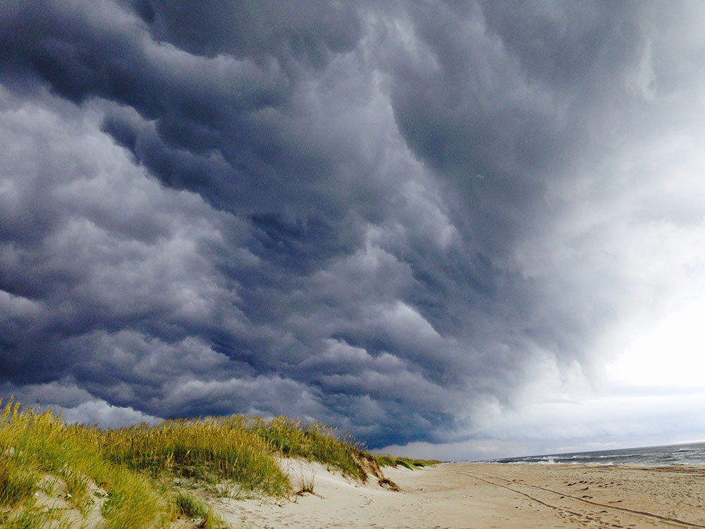 Ominous clouds rolling in on a beachfront