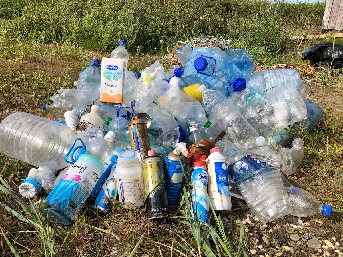 A small pile of discarded plastic bottles.