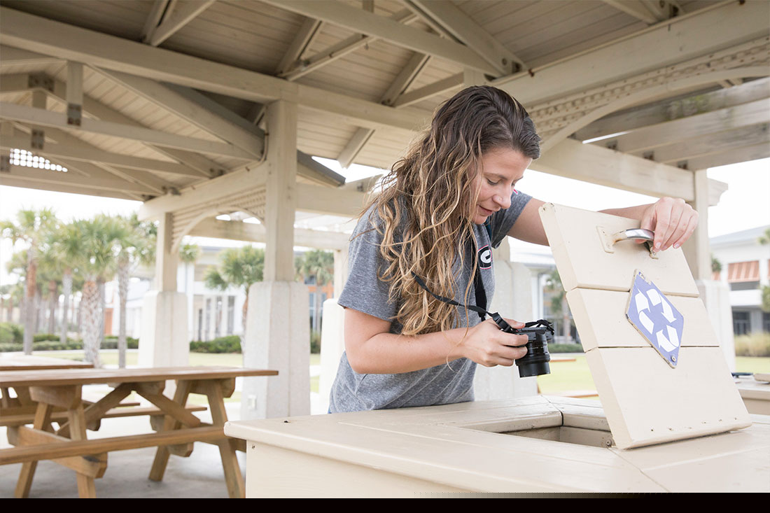 The research team may be seen taking pictures of litter items or waste management infrastructure, as photographic documentation is a key part of data collection for CAP.