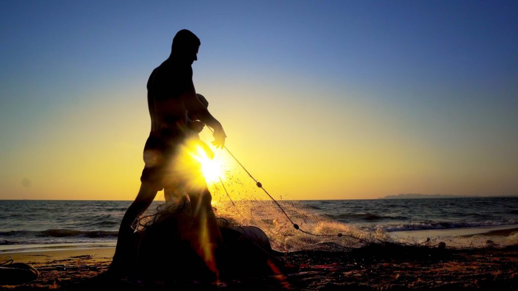 Silhouette Fishermen using fishing nets, fishing with nets in the morning sunrise, cinematic
